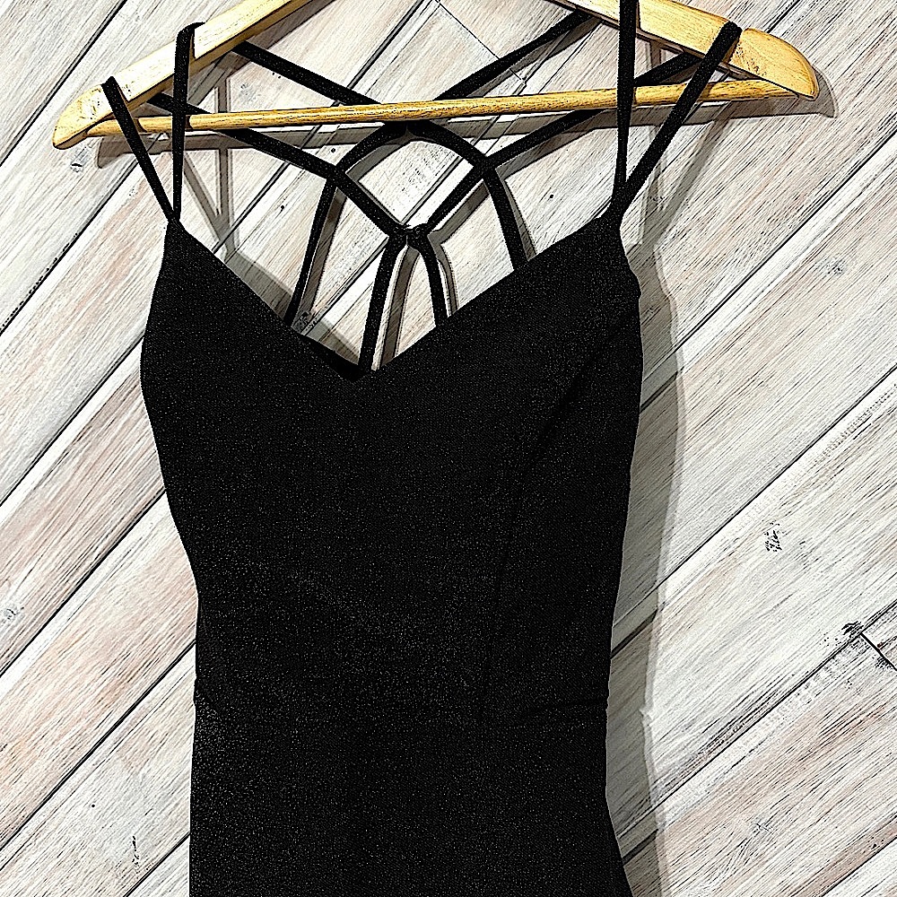 Shimmery black, scrappy low back dress